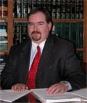 Chris Moore of Leonard & Moore Legal Services